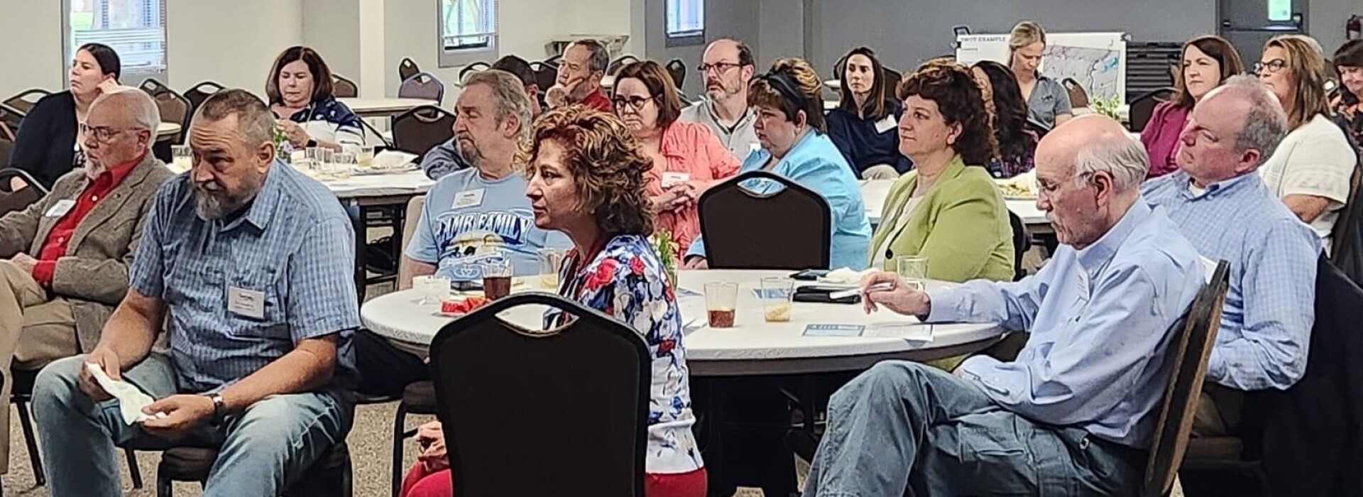 Room full of people at presentation